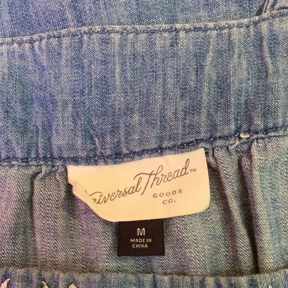 Super cute denim dress with embroidered detailing. - Picture 3 of 4